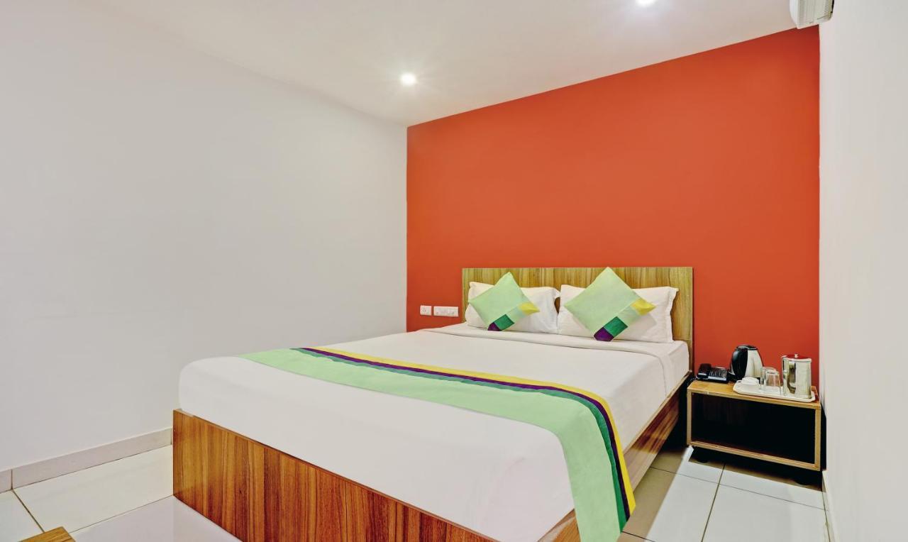 Treebo Sai Suites Inn Nagavara Bangalore Exterior foto
