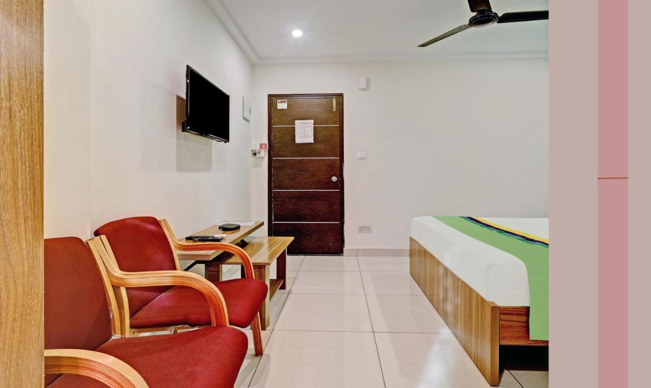 Treebo Sai Suites Inn Nagavara Bangalore Exterior foto